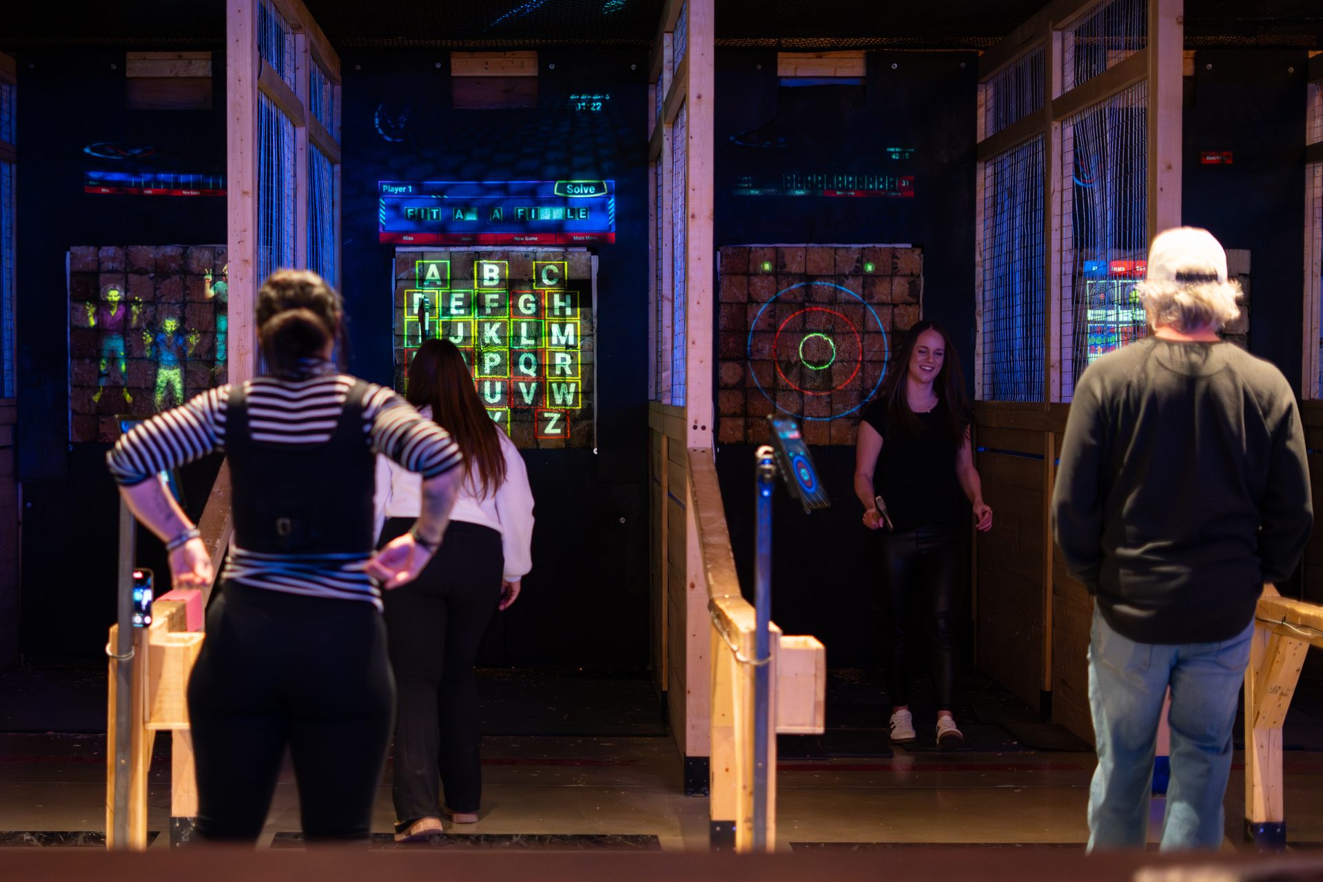 Axe throwing group at Volt Raceway